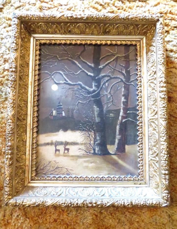 Painting of a snowy winter landscape with trees, a building in the distance, and deer. Framed in gold.