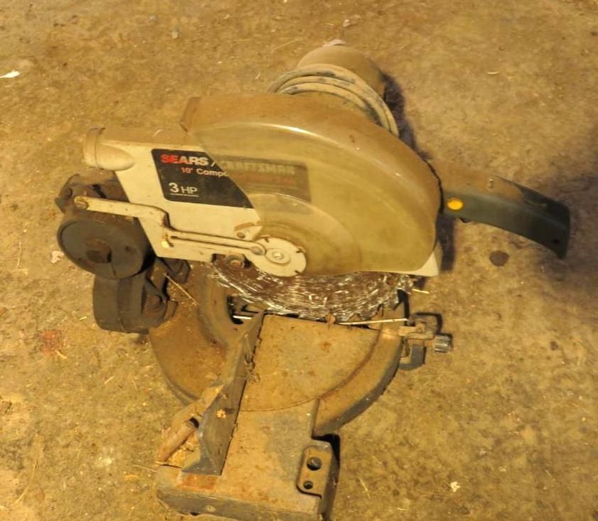 Sears Craftsman miter saw, gray and black.