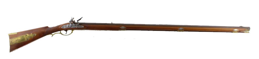 A brown antique flintlock rifle on a white background.