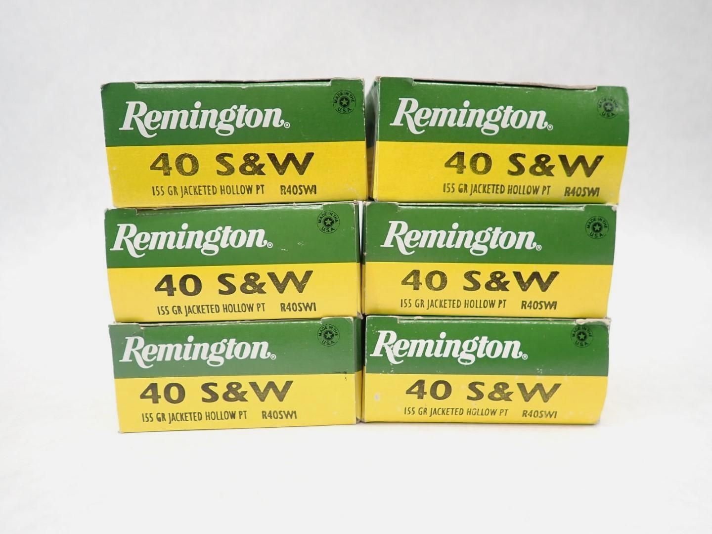Six boxes of Remington 40 S&W ammunition stacked. Green and yellow boxes with black text.