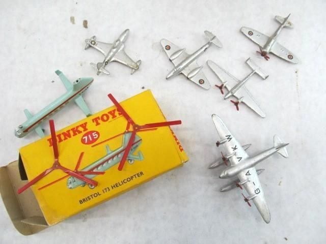 Toy airplanes and helicopter with a
