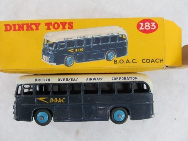 Dinky Toys 283 B.O.A.C. coach model in dark blue and white, with yellow box.