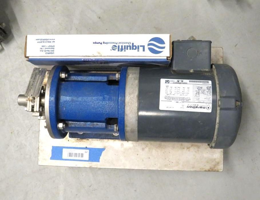 Electric motor and pump assembly with blue and gray components, on a white surface.