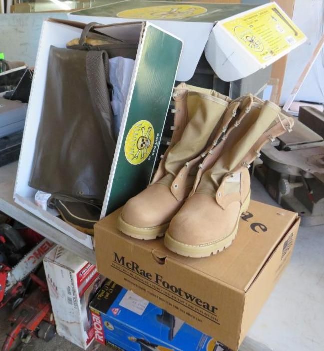 Tan McRae combat boots on a cardboard box, with a green box.