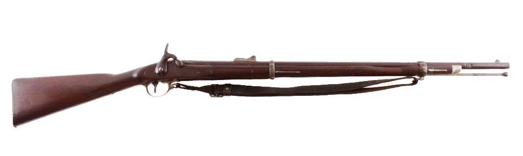 A Civil War era musket, brown wood stock and barrel with a black strap.
