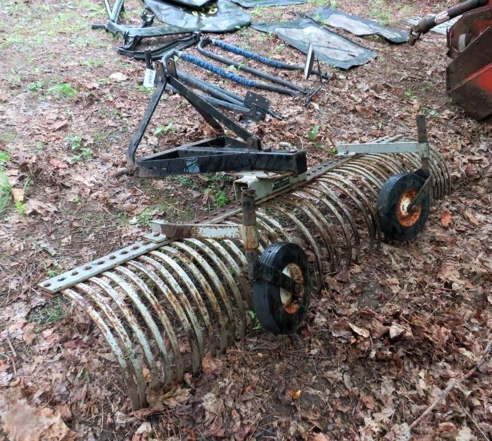Agricultural landscape rakewith black hitch.