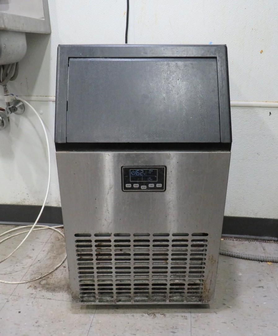 Stainless steel ice machine with a dark gray top, control panel, and vent.
