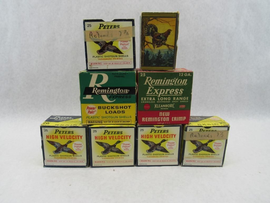 Boxes of vintage shotgun shells, featuring various brands and duck illustrations.