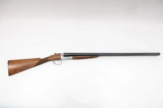 A wooden and metal double-barreled shotgun, lying horizontally against a white background.