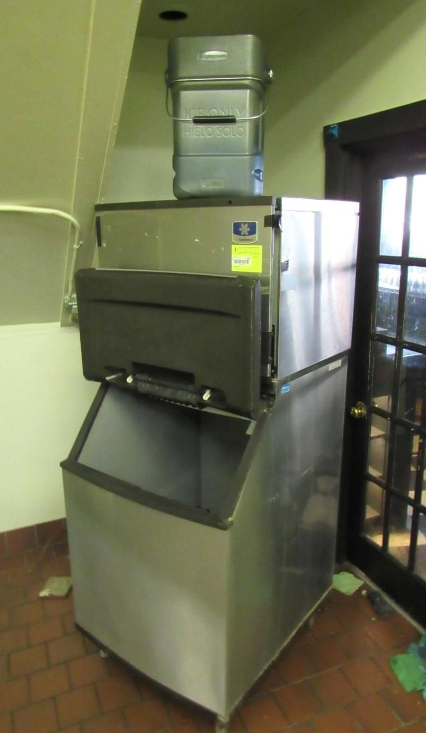 An industrial ice machine in a commercial setting.