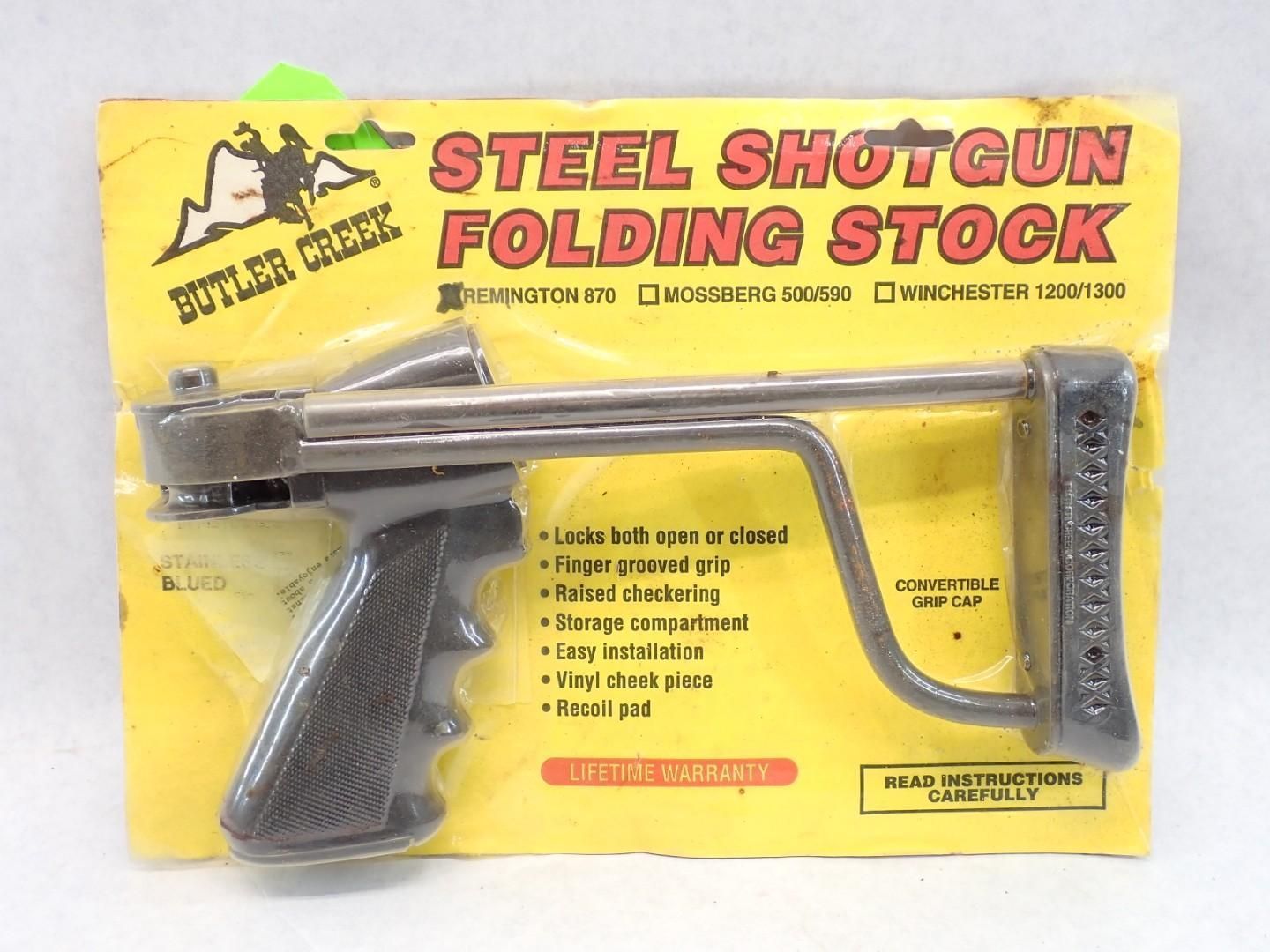 Steel shotgun folding stock on a yellow cardboard package, black grip, silver metal, black text.
