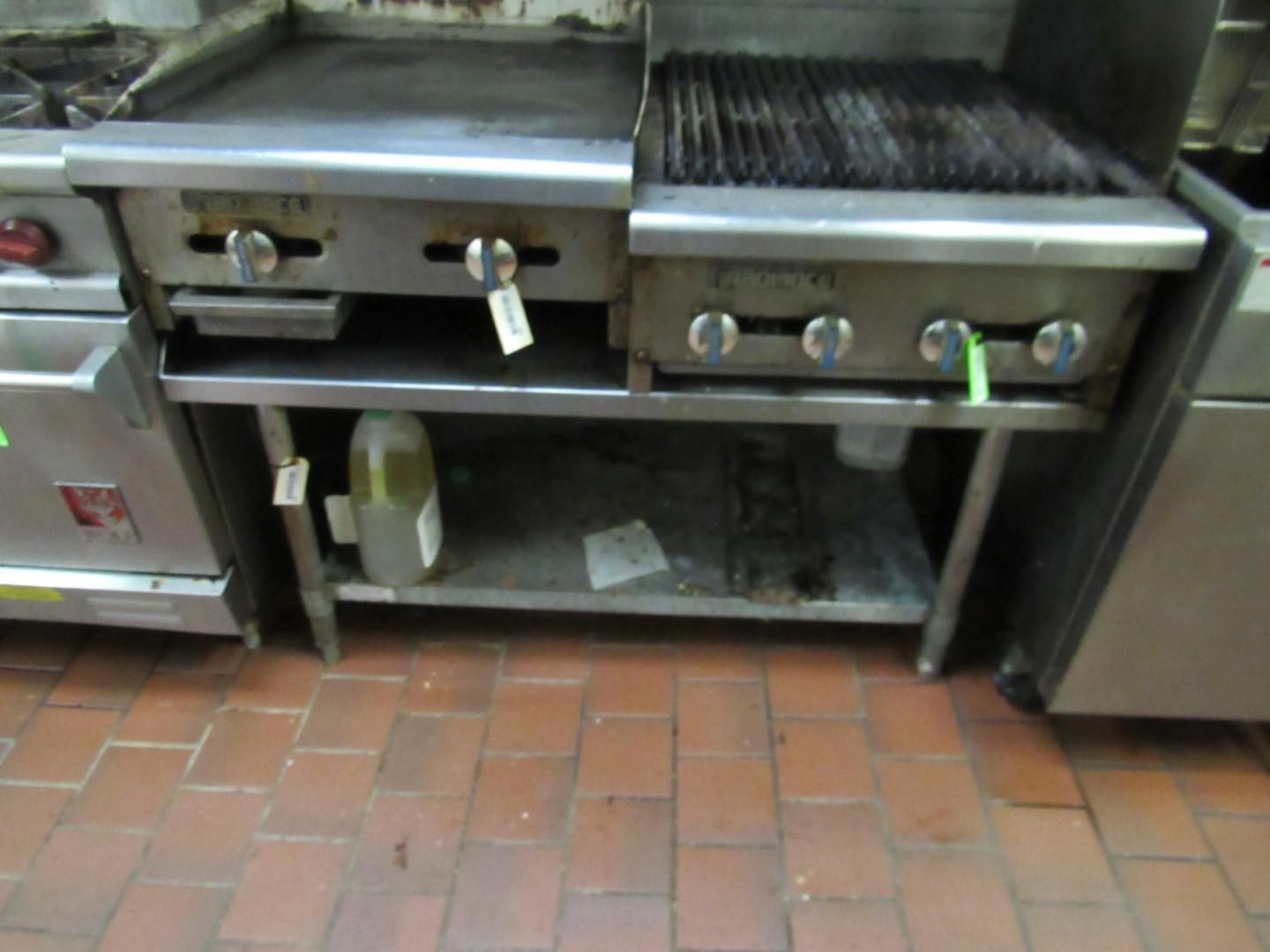 Commercial flat top and grill combination stove in a kitchen setting.