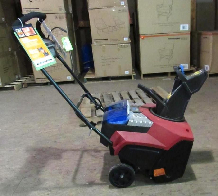 Red and black electric snowblower with blue accents, handles, and wheels, on a pallet.