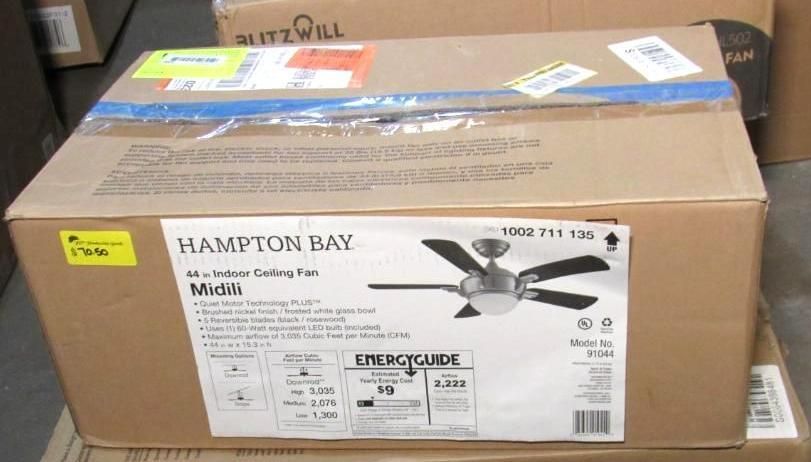 Box for a Hampton Bay Minka Indoor Ceiling Fan; brown box with labels and tape.