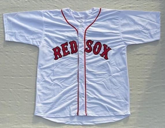 White Boston Red Sox baseball jersey with red lettering and trim.