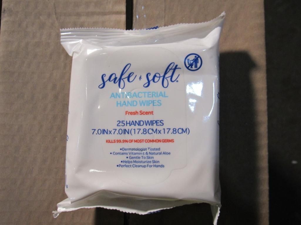 White package of Safe Soft antibacterial hand wipes on a wooden surface.