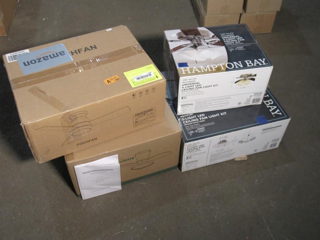 Boxes stacked on a gray floor, one labeled