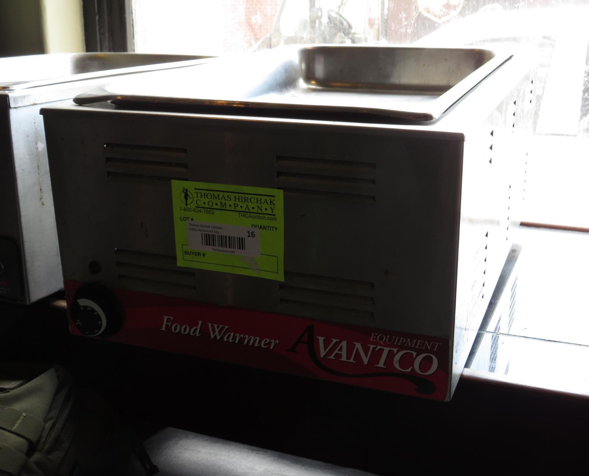 Food warmer with a stainless steel pan. Has a black control knob and a red panel that says