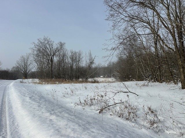 4.2 acre land parcel in Fairfield Vermont with open and wooded areas