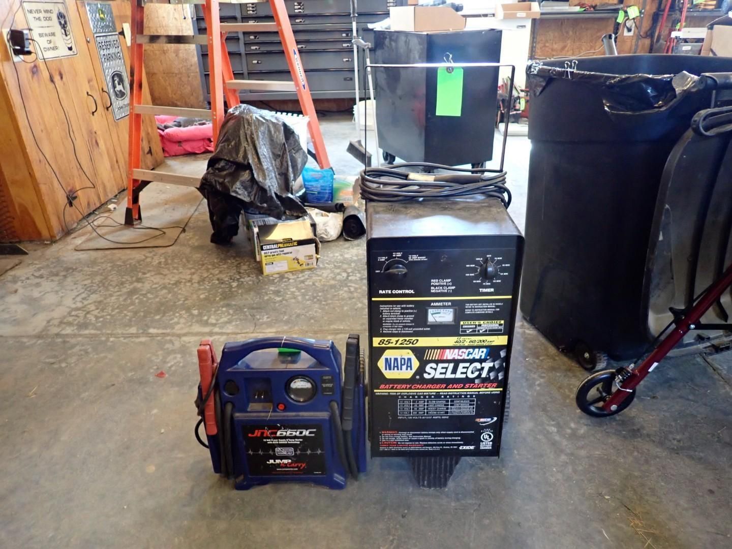 Blue generator and stacked boxes in a garage/workshop