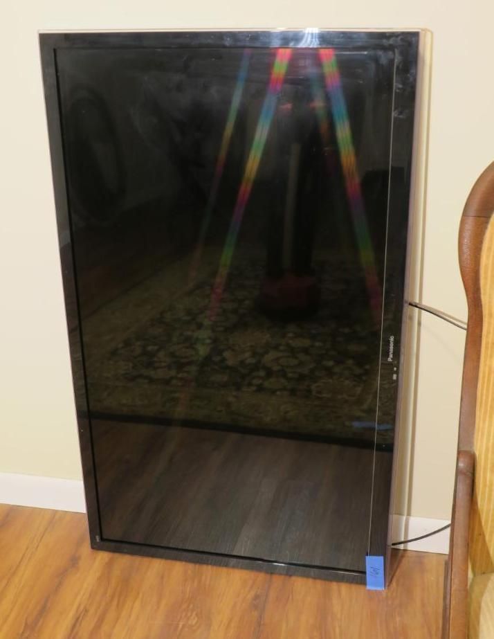 A large, black flat-screen TV.