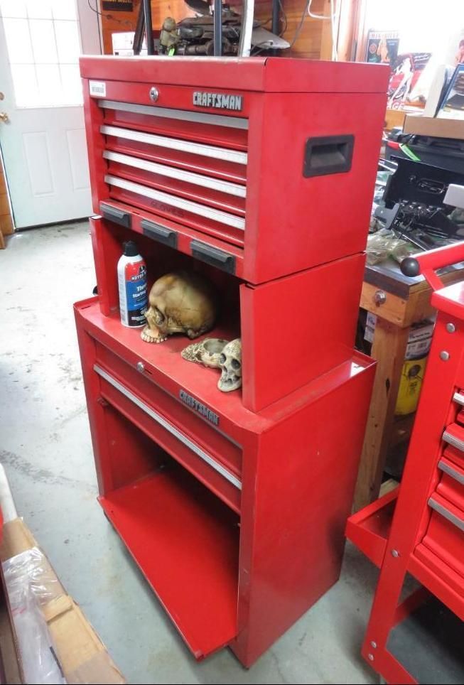 Red Craftsman tool chest, stacked. Top chest has drawers; the bottom has a shelf and drawers.