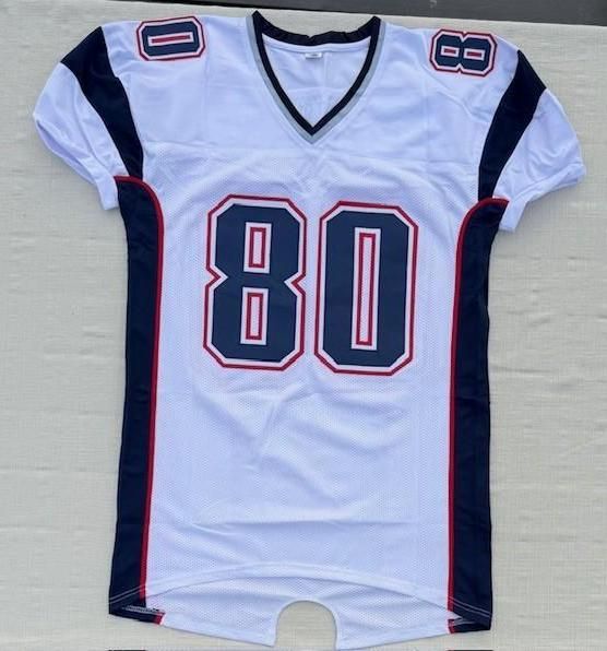 White football jersey with the number 80 in navy and red accents.