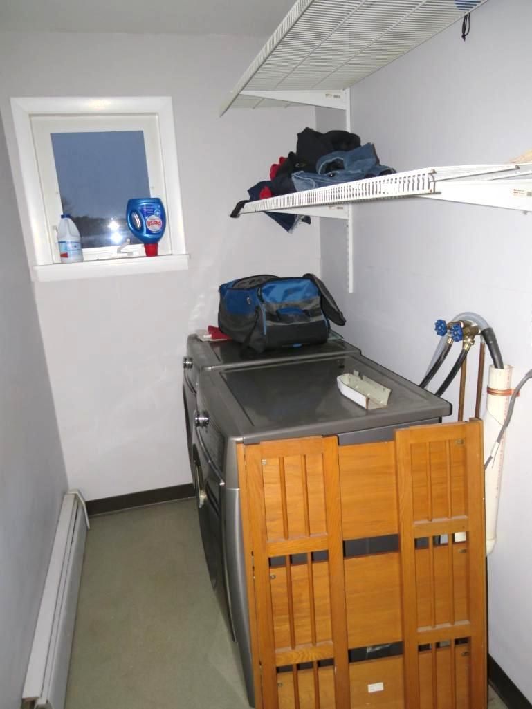 Laundry room with washe.
