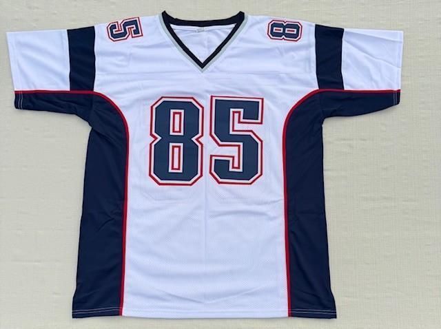 White and blue football jersey with the number 85 in blue with a red outline.