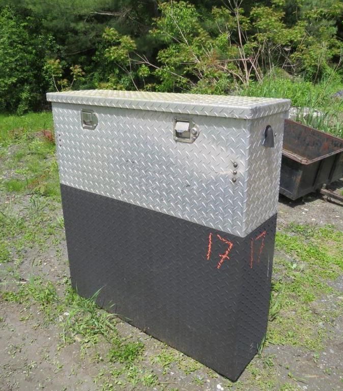 Large metal toolbox, silver top and black bottom, with