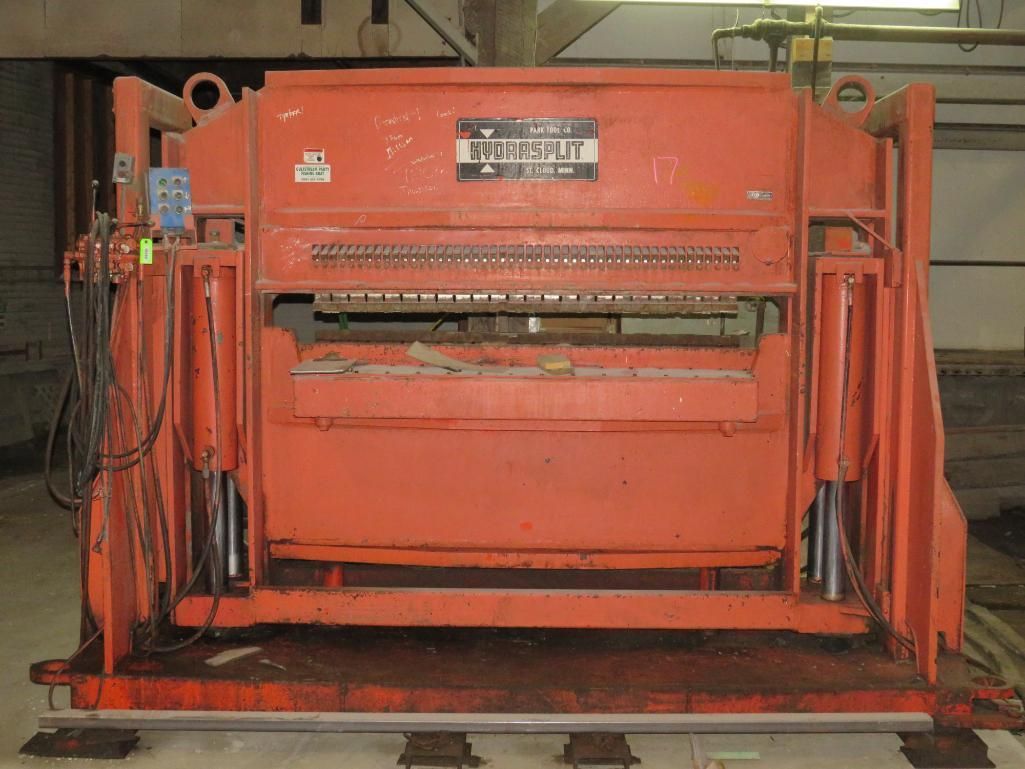 Orange industrial Hydrasplit 720 6' Stone/Block Splitter, in a warehouse setting.