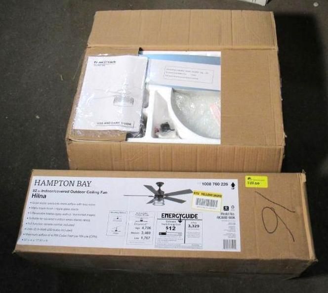 Two open cardboard boxes: one with instructions, the other labeled