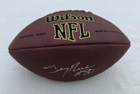 Brown NFL football signed by Jerry Rice.