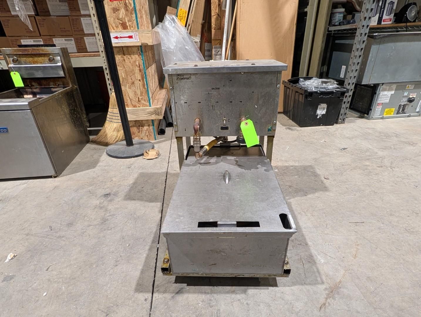 Metal utility cart and equipment in a workshop/garage
