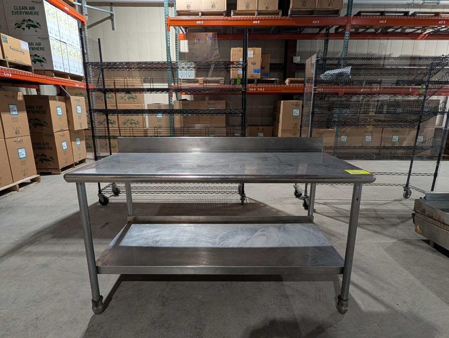 Stainless steel worktable with lower shelf 