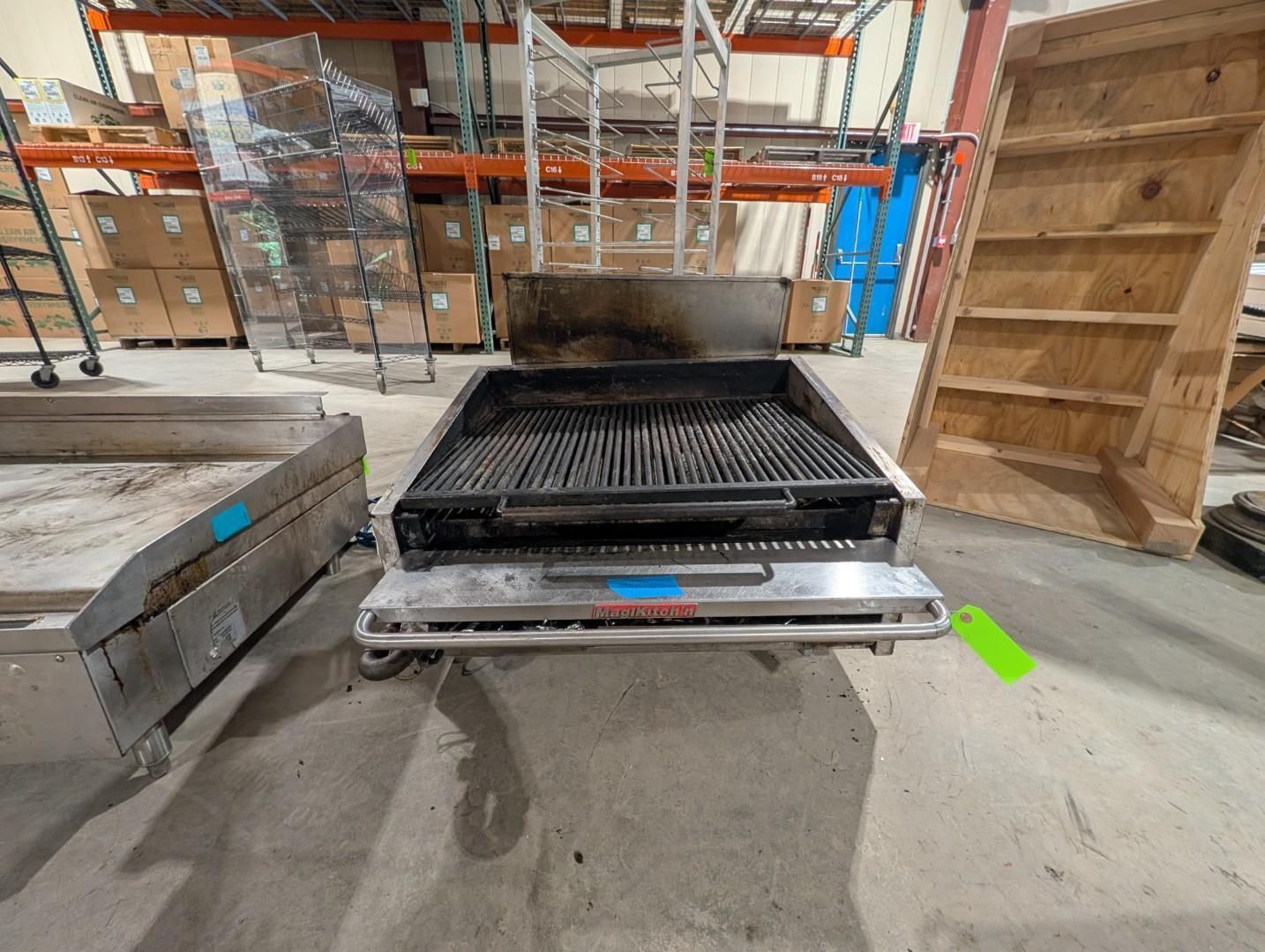 Black grill with open lid