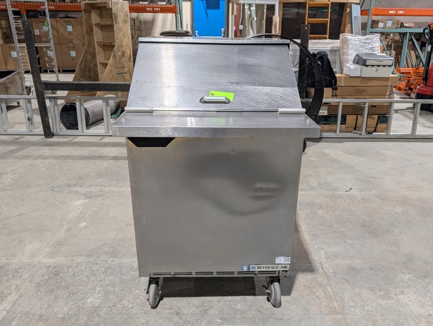 Stainless steel utility cart on wheels