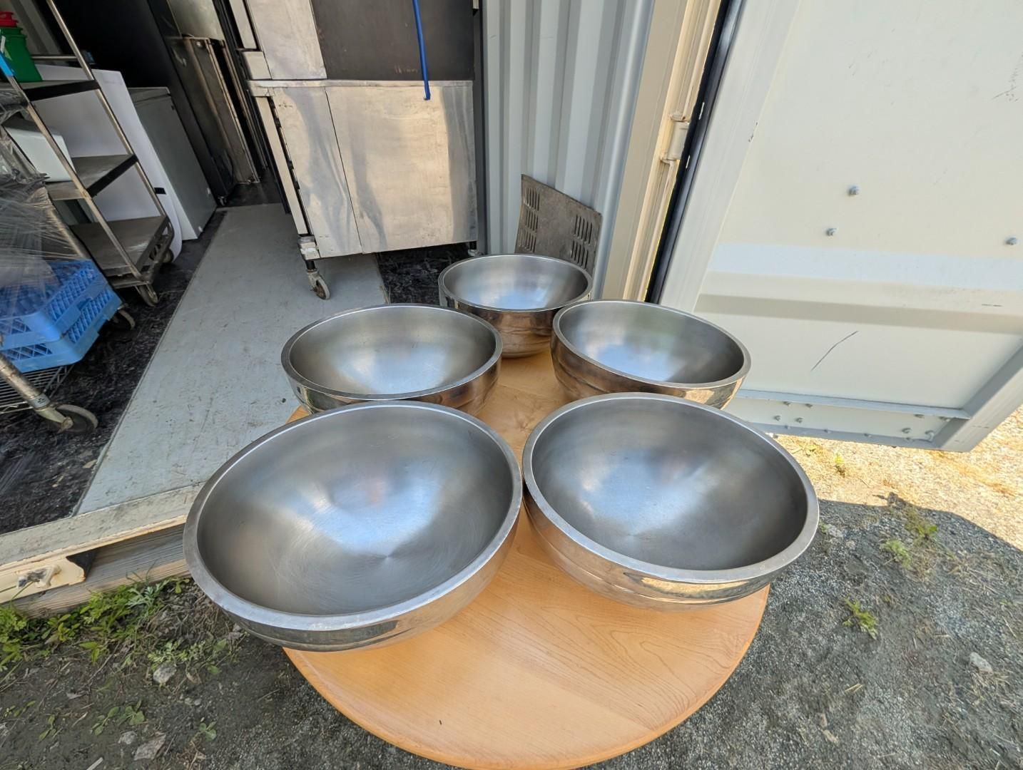 Five stainless steel mixing bowls