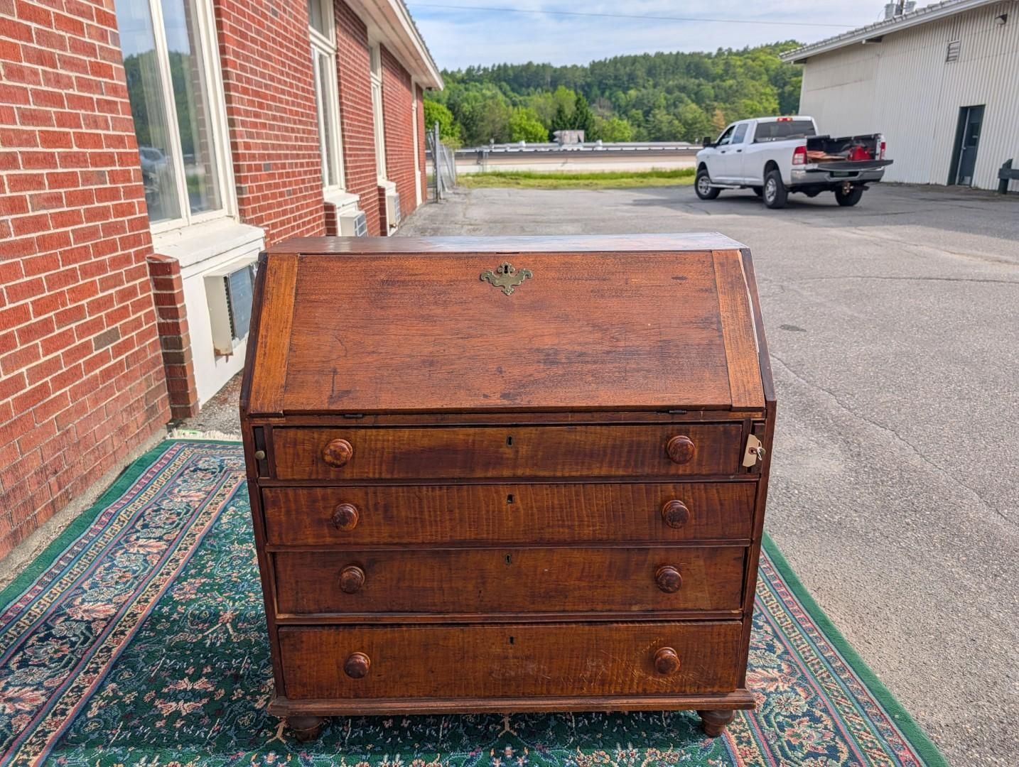 Vintage wooden slant-top desk