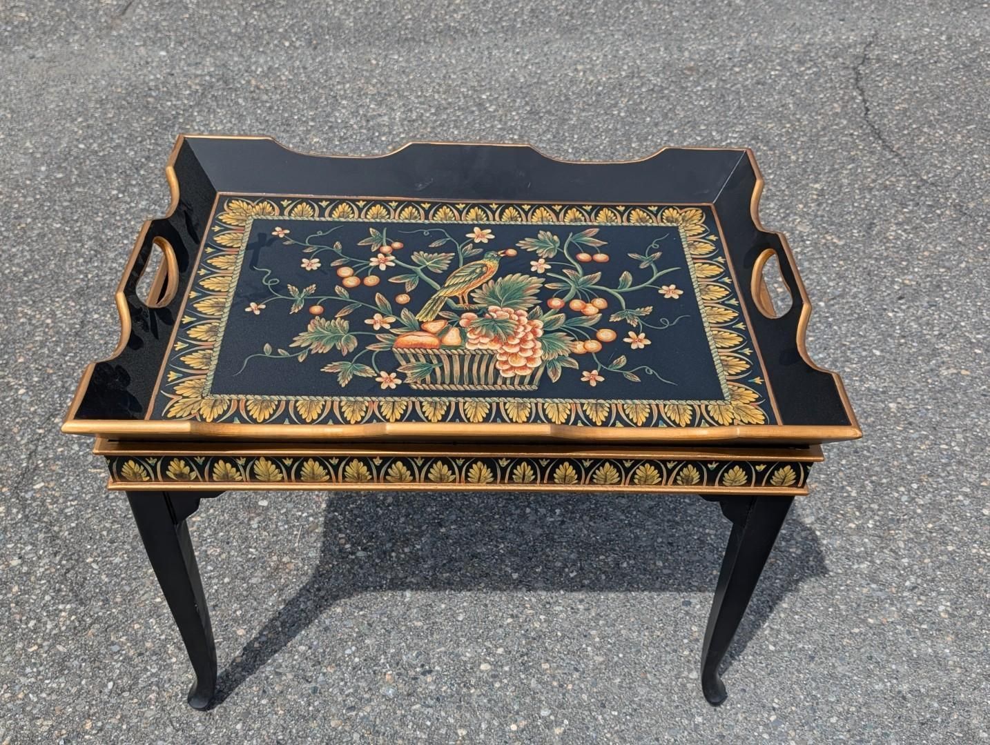 Black lacquer tray table with floral inlay and carved handles