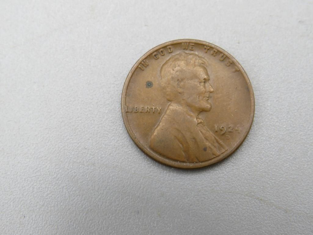 Bronze-colored penny with Abraham Lincoln's profile.