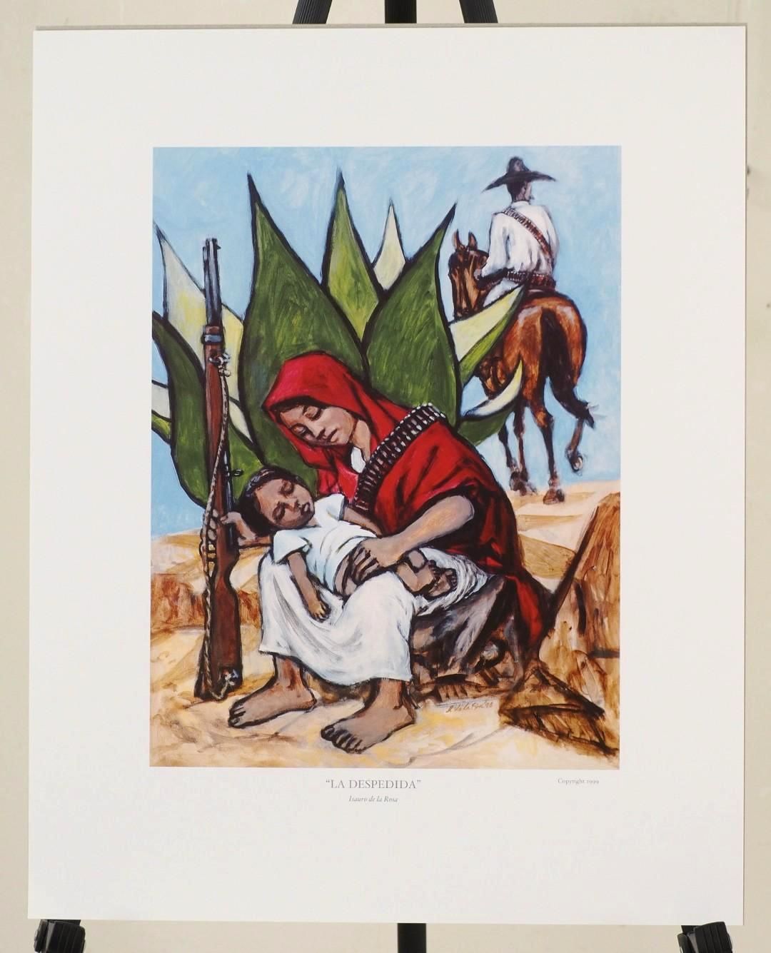 Woman holding a child sits near a rifle and agave plant, a rider on a horse in the background.