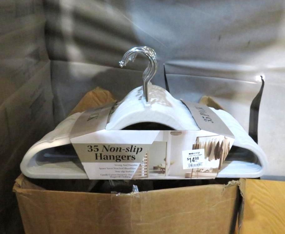 Box of 35 non-slip white clothes hangers, silver hook, label on top.