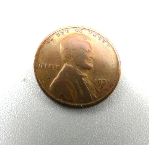 1931 Lincoln penny, copper-colored, obverse side showing Lincoln's profile,