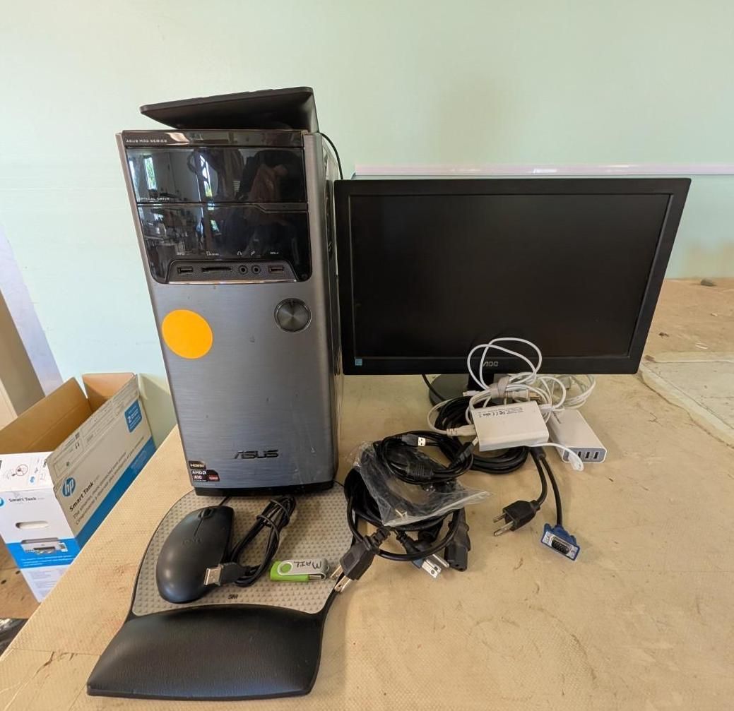 Desktop tower, monitor, mouse, keyboard, cables