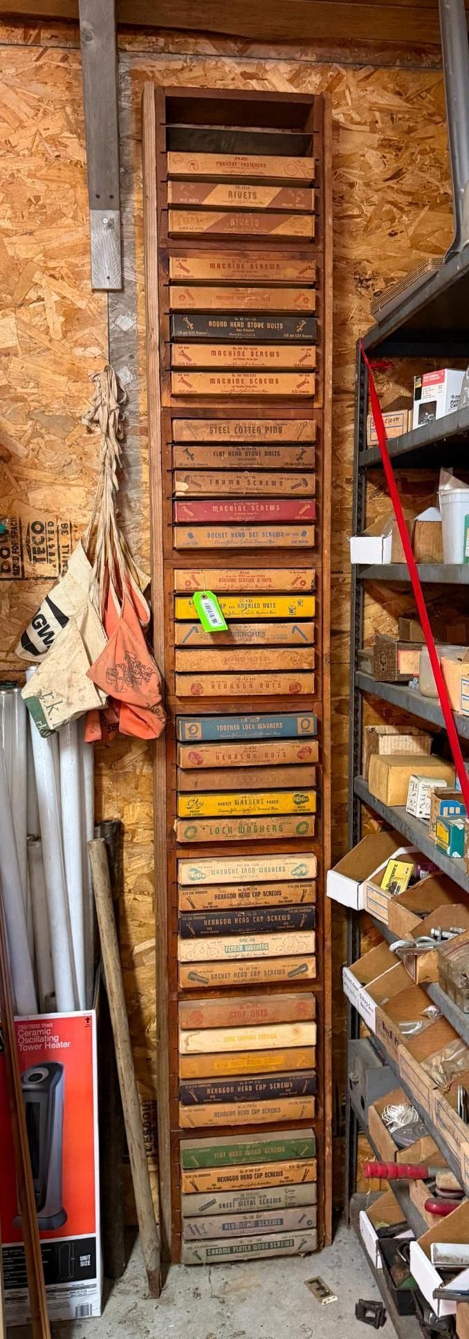 Tall narrow wooden ladder or rack with colorful slats