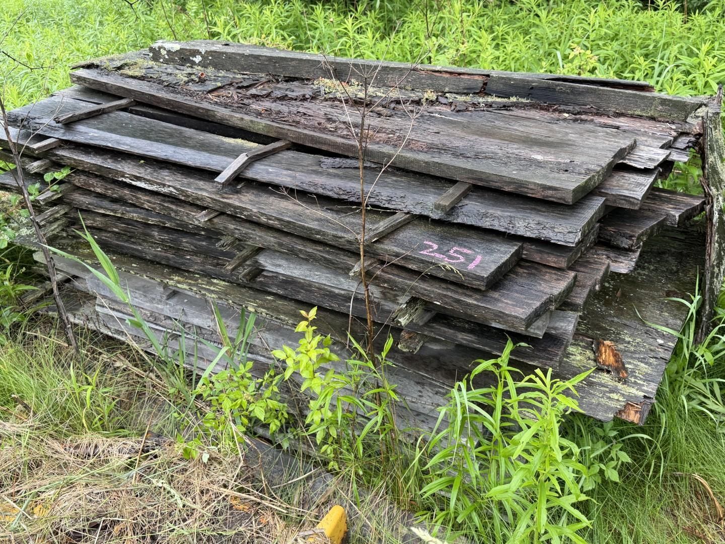 Stack of wooden boards outdoors