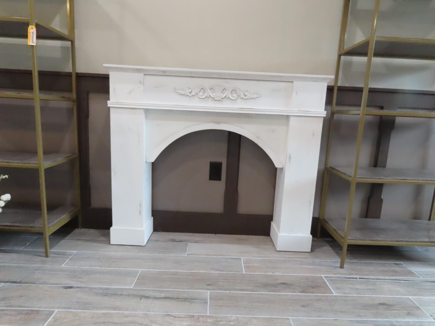 White decorative fireplace mantel