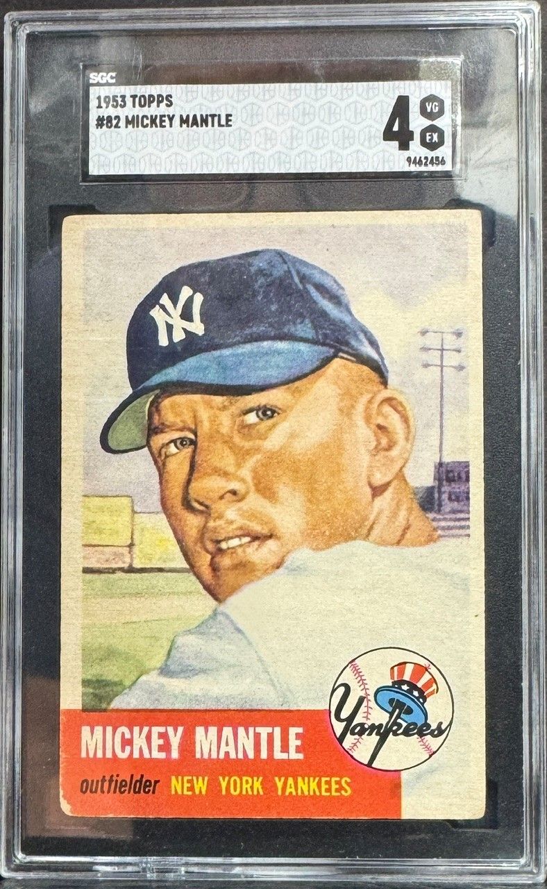 Vintage Mickey Mantle baseball card in a clear case, showing the Yankees player in a blue cap and red nameplate.