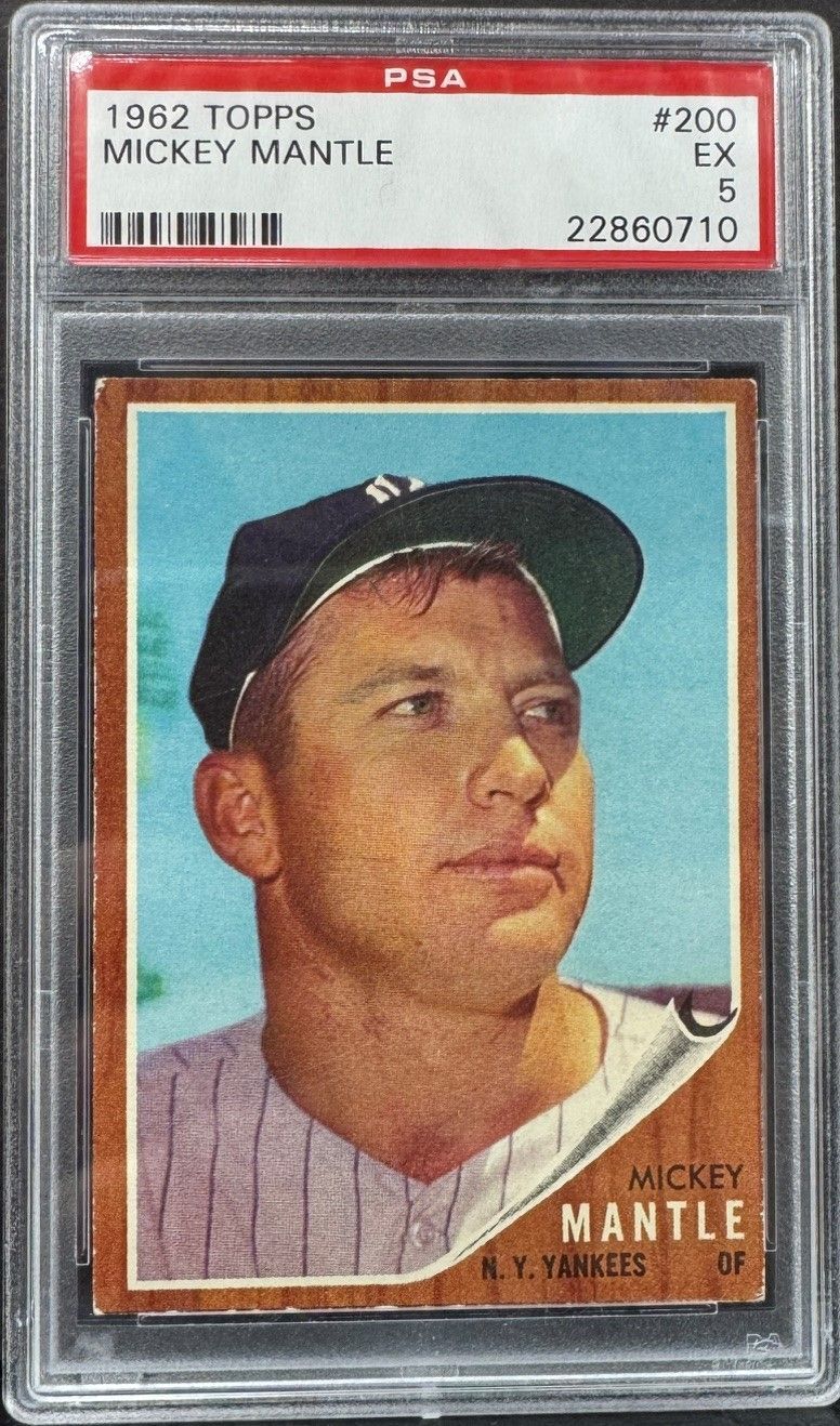 Graded 1982 Topps Mickey Mantle baseball card in a PSA slab, showing Mantle in Yankees cap.